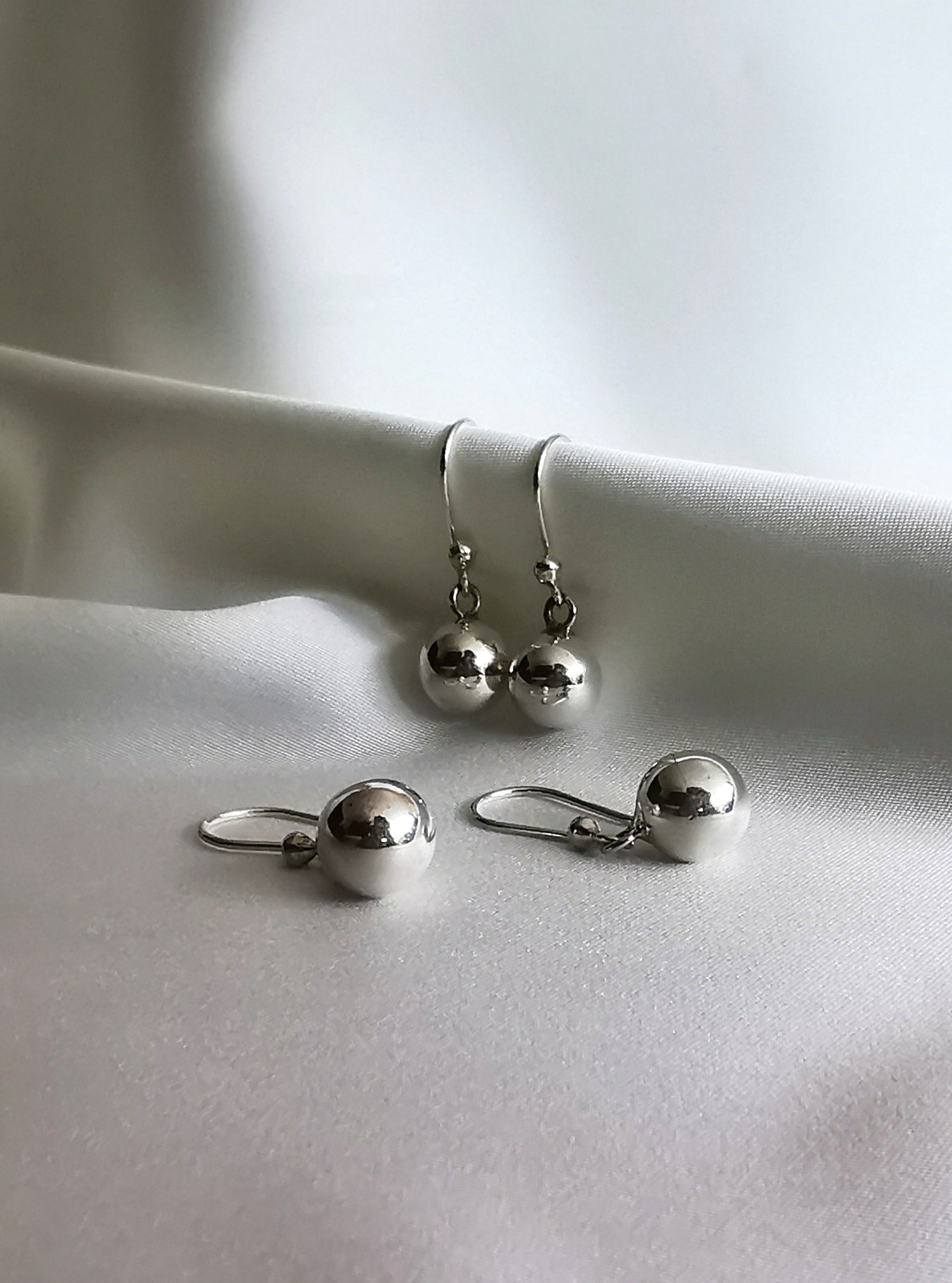 Arete de bola plata brillante (02125-215)