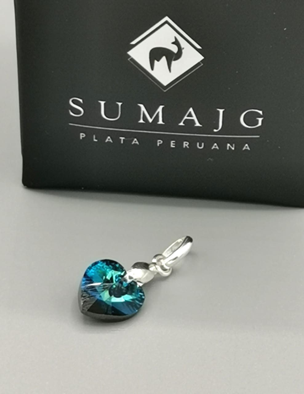(04175-142)Dije de corazón de cristal swarovski azul