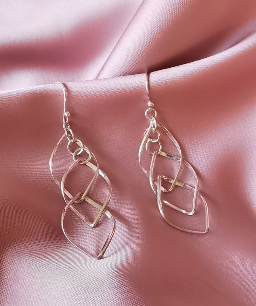 (15275-242) Aretes de rombo