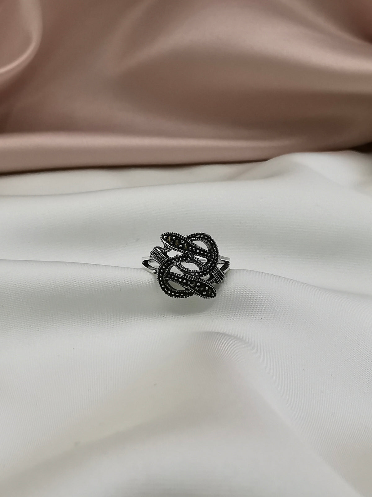 Anillo trenzado con zirconias (09325-198)