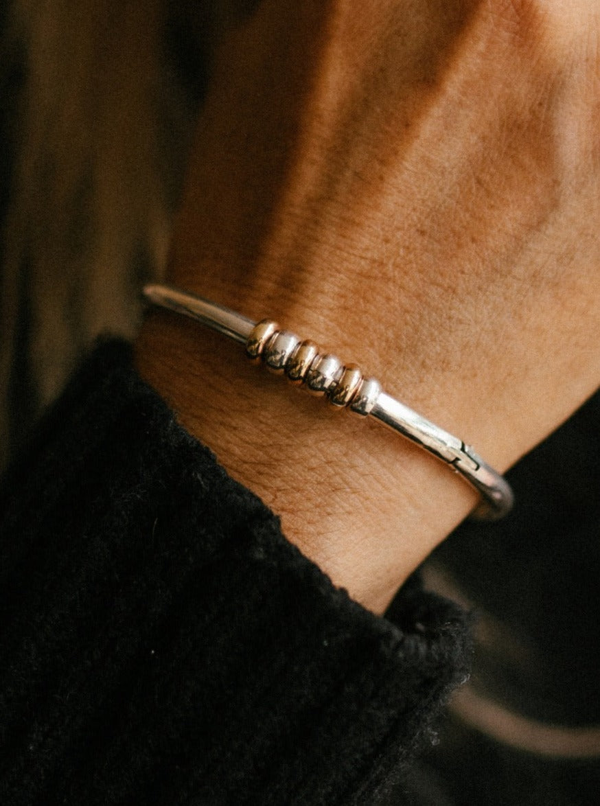 (05652-079) Pulsera aro de plata y oro de 18K