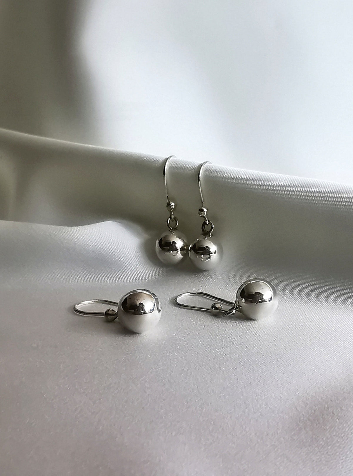 Arete de bola plata brillante (02125-215)