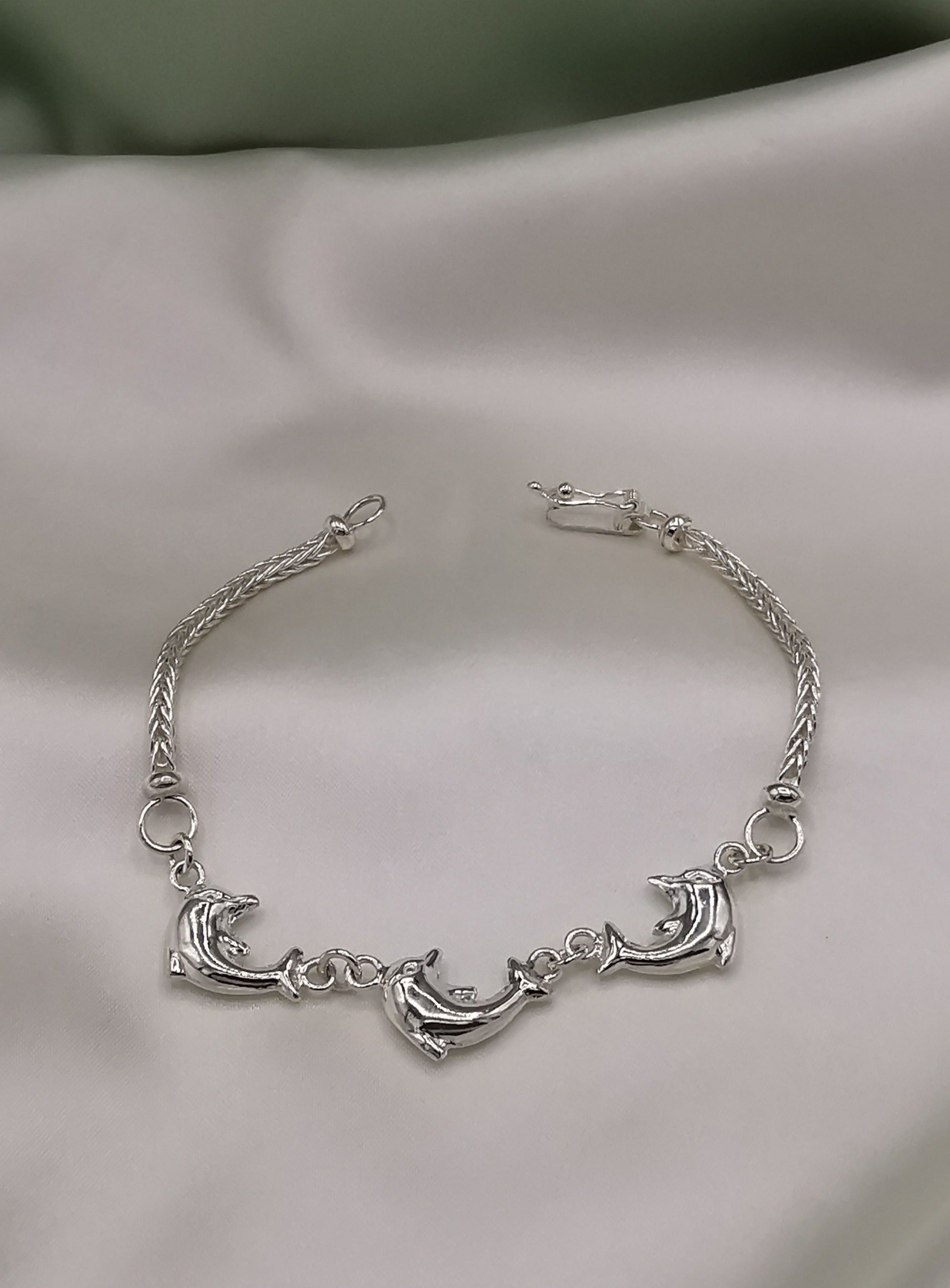 (06375-030) Pulsera de plata lazo espiga de Delfines.
