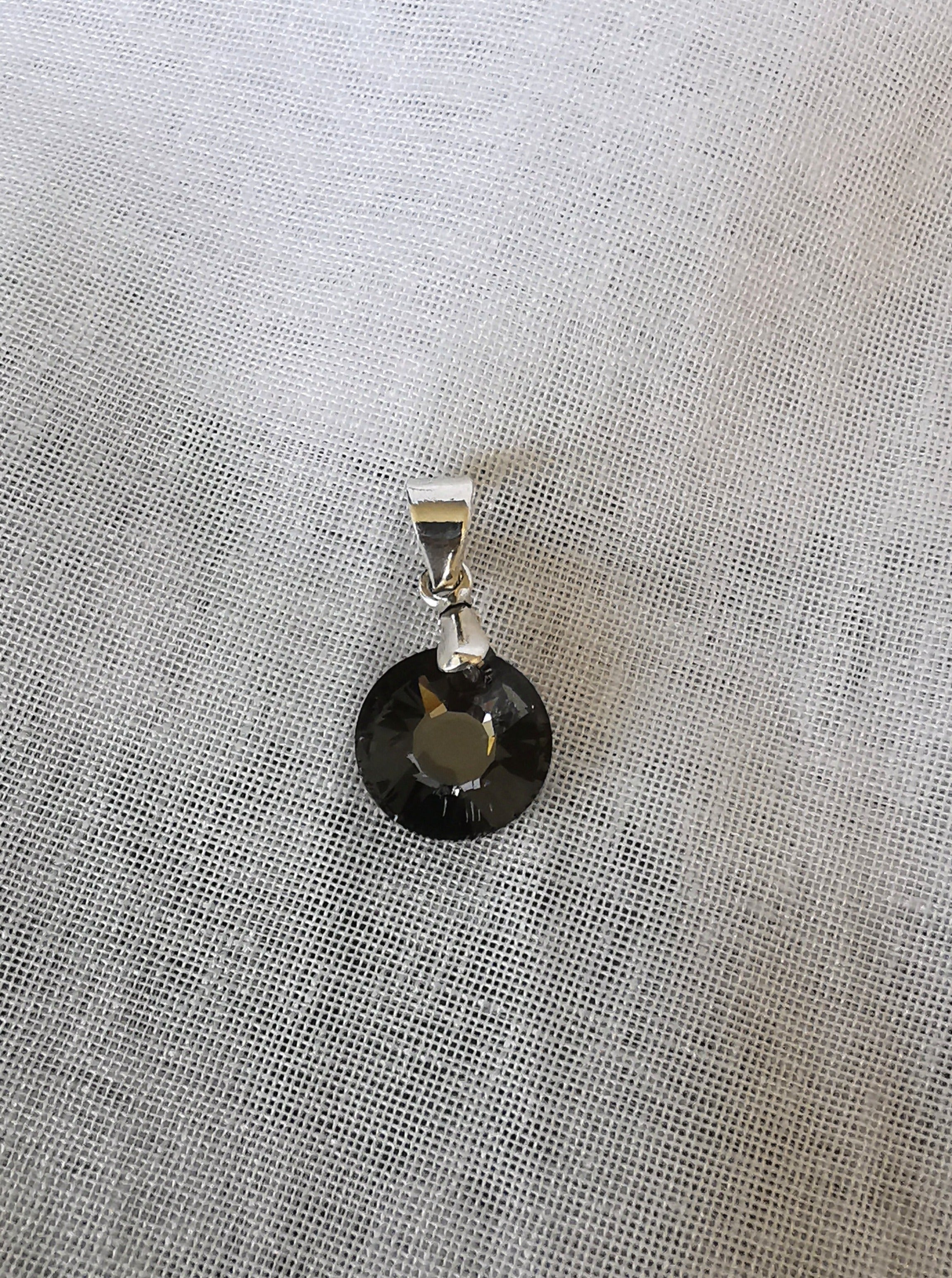 (04200-108) Dije de cristal Swarovski redondo