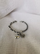 (171400-801) Pulsera plata envejecida con dijes