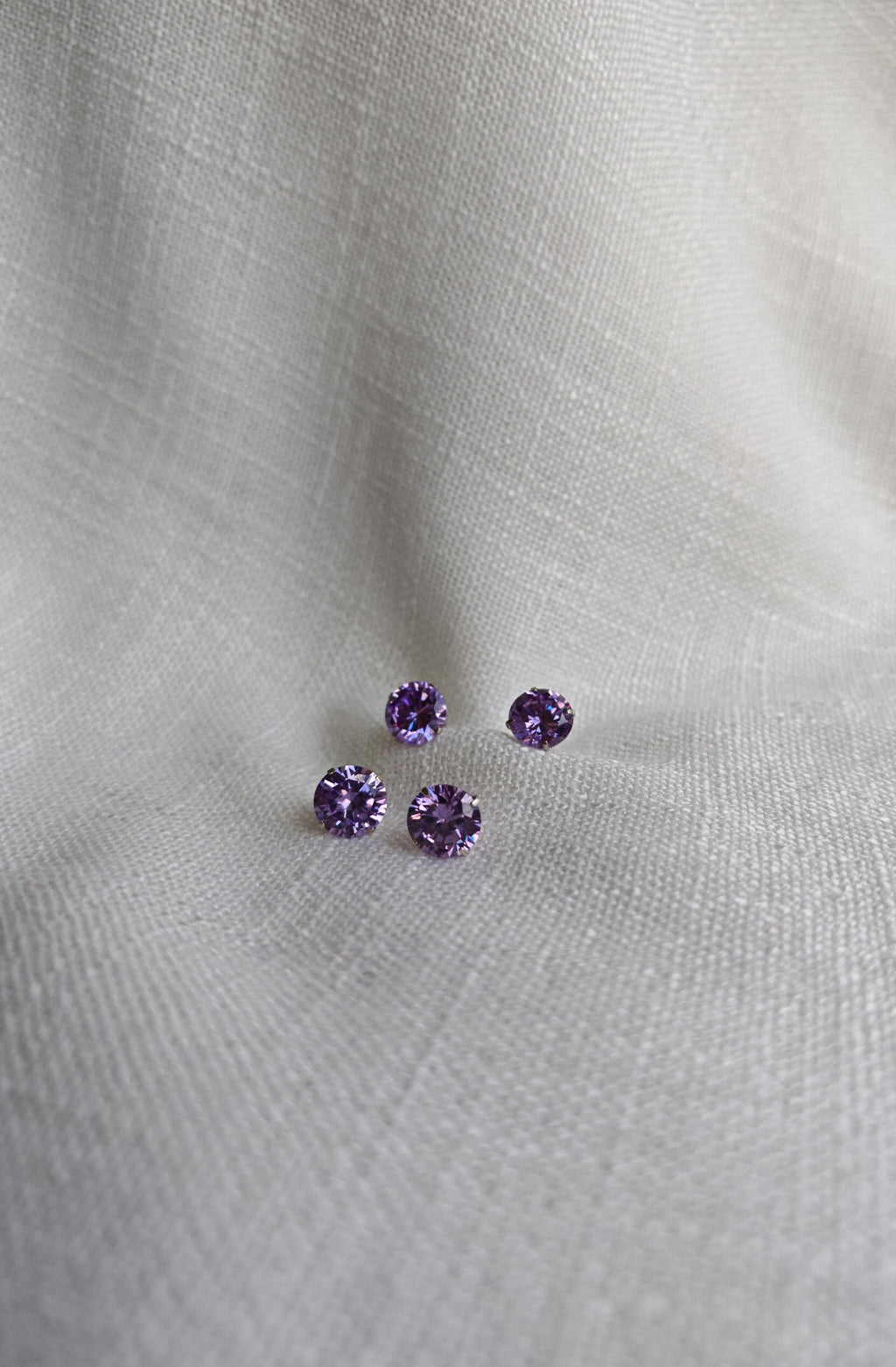 Aretes de zirconia morada (02225)
